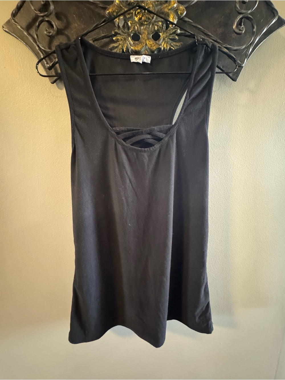 All Tanks 3 for $15!! 🎉 
Black Sleeveless Tank with Front Strap Detail